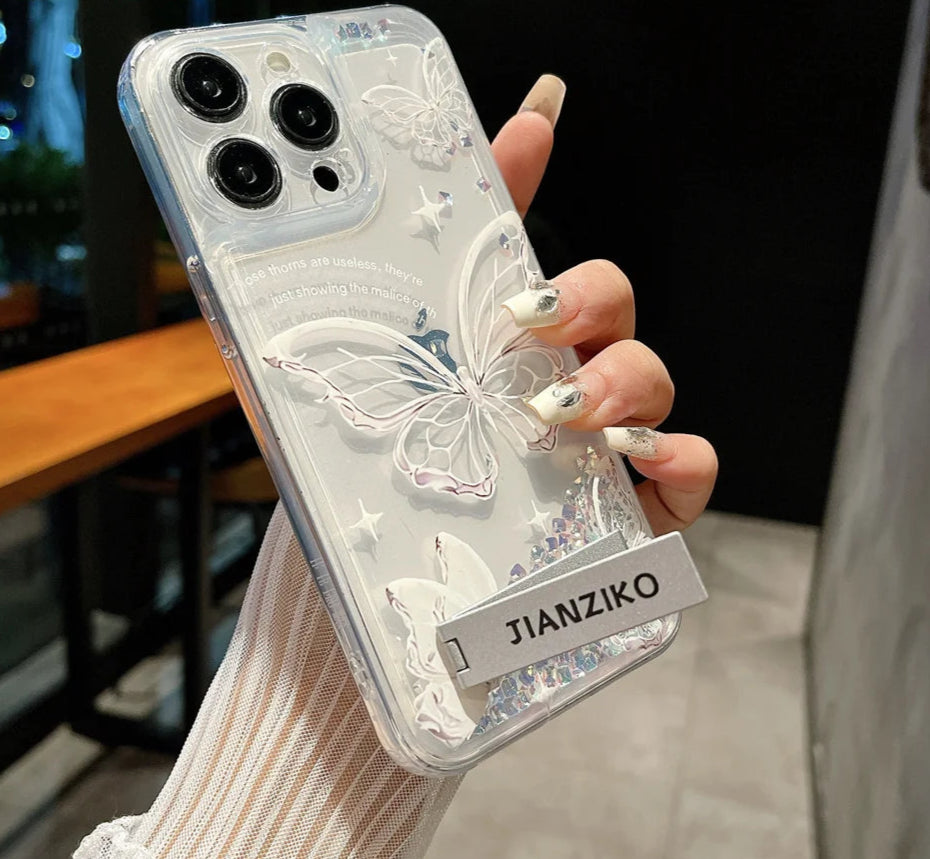 Flowing Sand Diamond Butterfly Clear Case for iPhone 11-15 Pro Max – Stylish and Protective Quicksand Cover with Shiny Glitter, Elegant Butterfly Design, Built-in Invisible Metal Bracket, Shockproof and Scratch-Resistant for Ultimate Durability and Luxury.