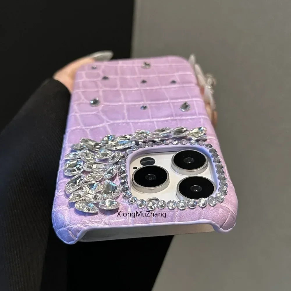 Purple Crocodile Rhinestone iPhone Case - Custom women's cover with luxurious purple crocodile texture, sparkling rhinestone accents, and shockproof protection for a stylish and durable iPhone case.