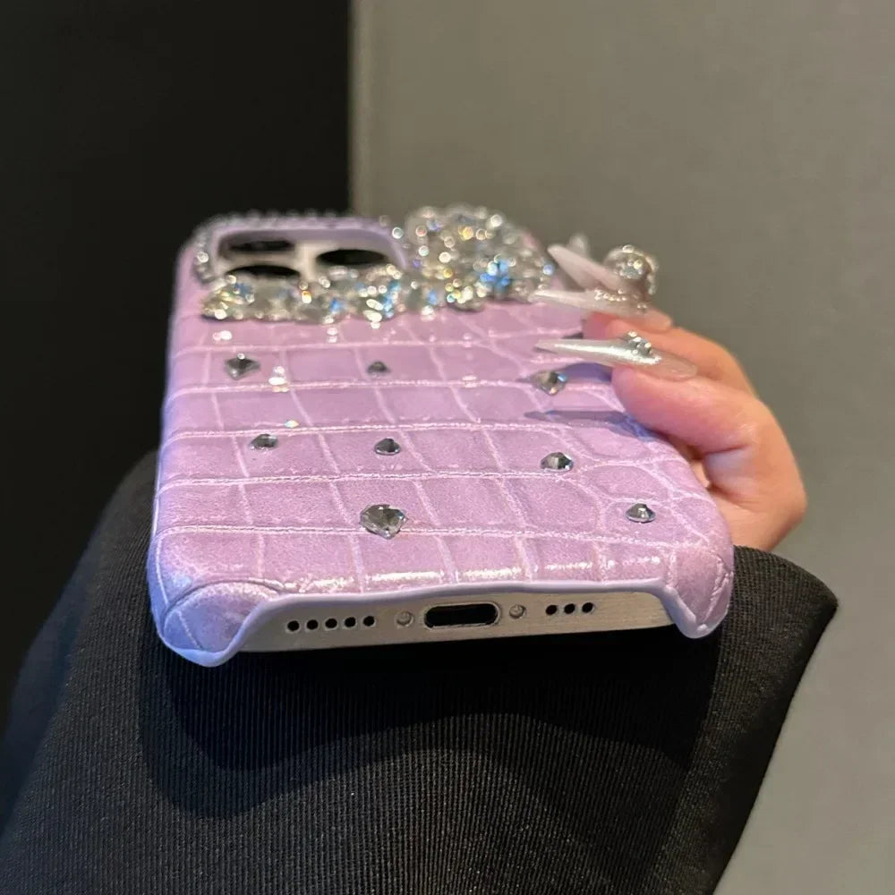 Purple Crocodile Rhinestone iPhone Case - Custom women's cover with luxurious purple crocodile texture, sparkling rhinestone accents, and shockproof protection for a stylish and durable iPhone case.