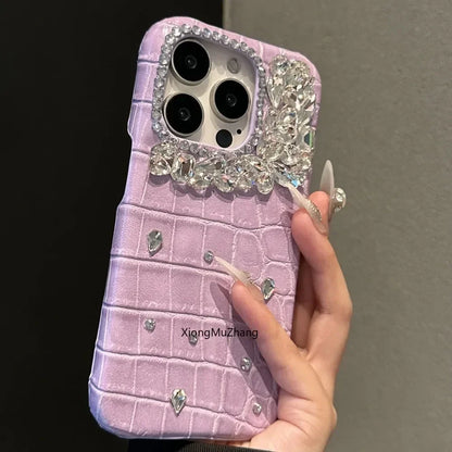 Purple Crocodile Rhinestone iPhone Case - Custom women's cover with luxurious purple crocodile texture, sparkling rhinestone accents, and shockproof protection for a stylish and durable iPhone case.